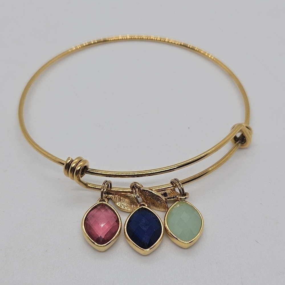 gold tone expandable bangle with multicolor charms